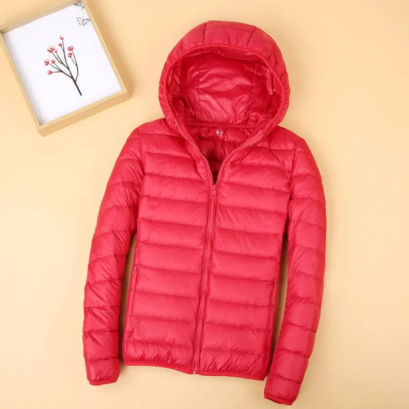 Autumn and Winter Women's Hooded Down Jacket 2026 New Simple Fashion Solid Color Elegant Commuter Mother Outdoor Jacket