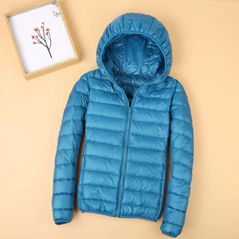 Autumn and Winter Women's Hooded Down Jacket 2026 New Simple Fashion Solid Color Elegant Commuter Mother Outdoor Jacket