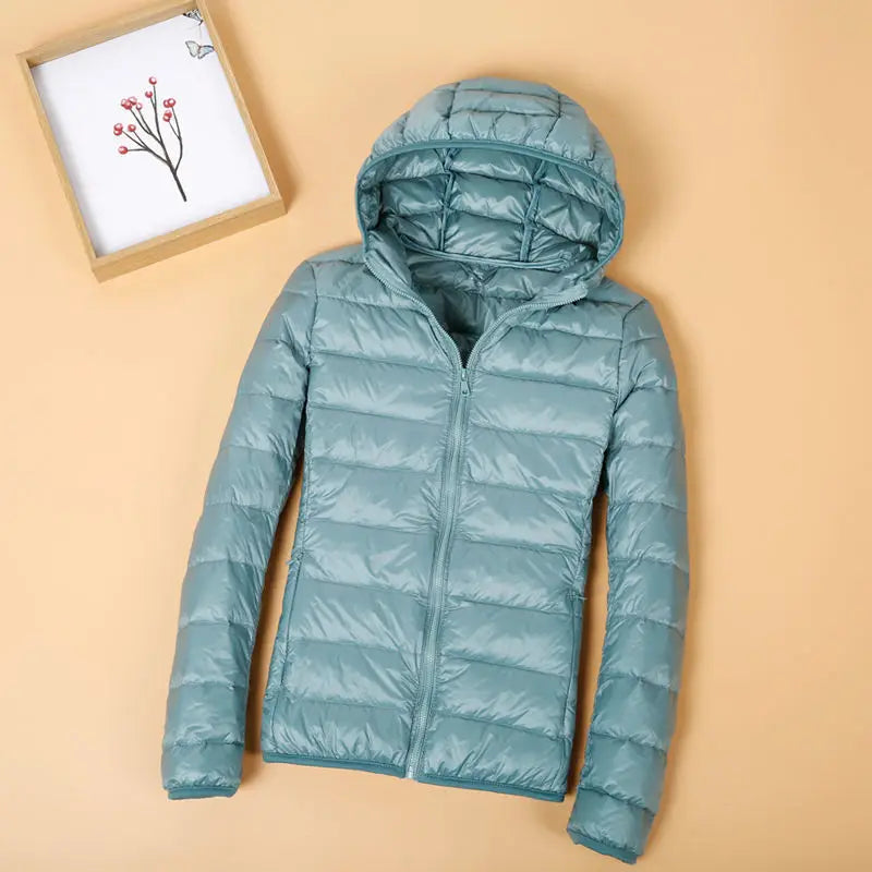 Autumn and Winter Women's Hooded Down Jacket 2026 New Simple Fashion Solid Color Elegant Commuter Mother Outdoor Jacket